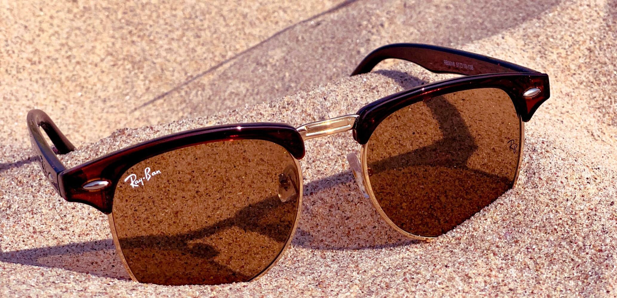 Rayban sunglasses in sand